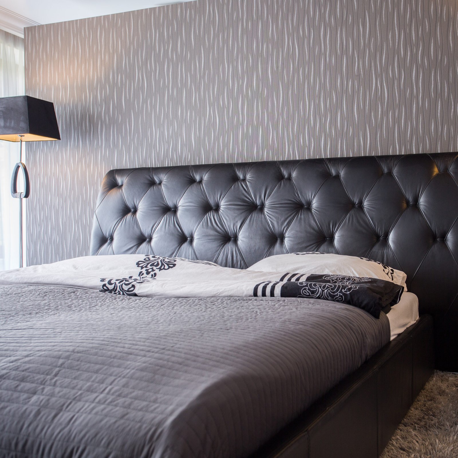 Modern and cozy bedroom in the house